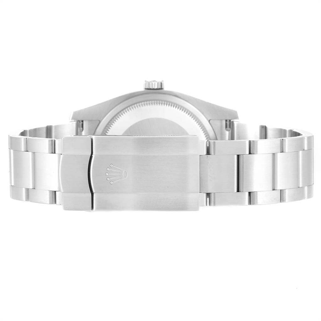 This image shows the clasp and part of the stainless steel bracelet of a Rolex Oyster Perpetual 116000 Men's Stainless Steel Grey Dial 116000 Men's Stainless Steel Grey Dial watch from the back angle.