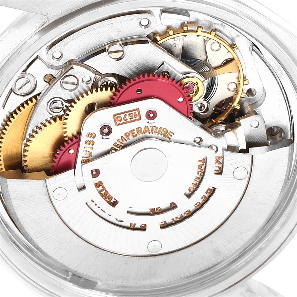 This image shows a close-up view of the internal mechanical movement components of a Rolex Oyster Perpetual 1603 Men
s Stainless Steel Silver Dial 1603 Men
s Stainless Steel Silver Dial watch.