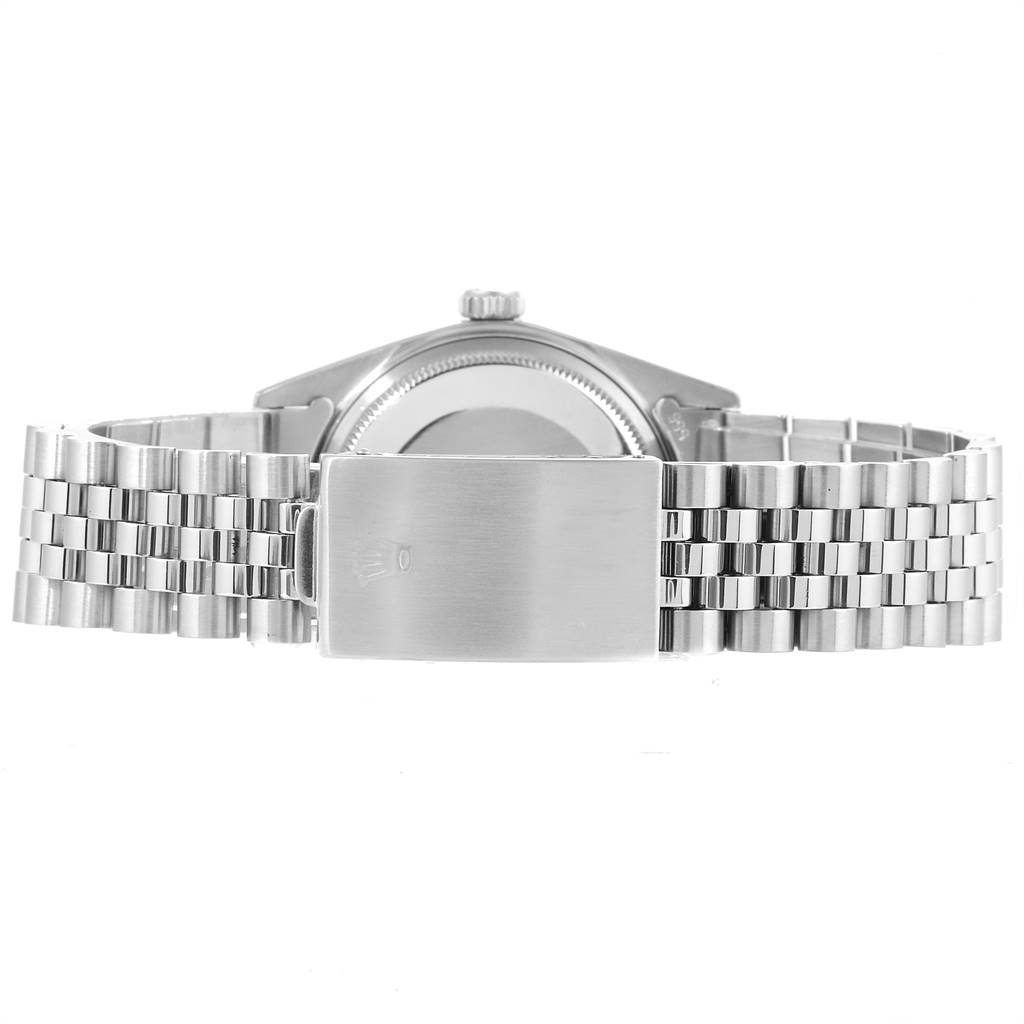 The image shows the back view of a Rolex Oyster Perpetual 1603 Men
s Stainless Steel Silver Dial 1603 Men
s Stainless Steel Silver Dial watch, highlighting the clasp and part of the bracelet.