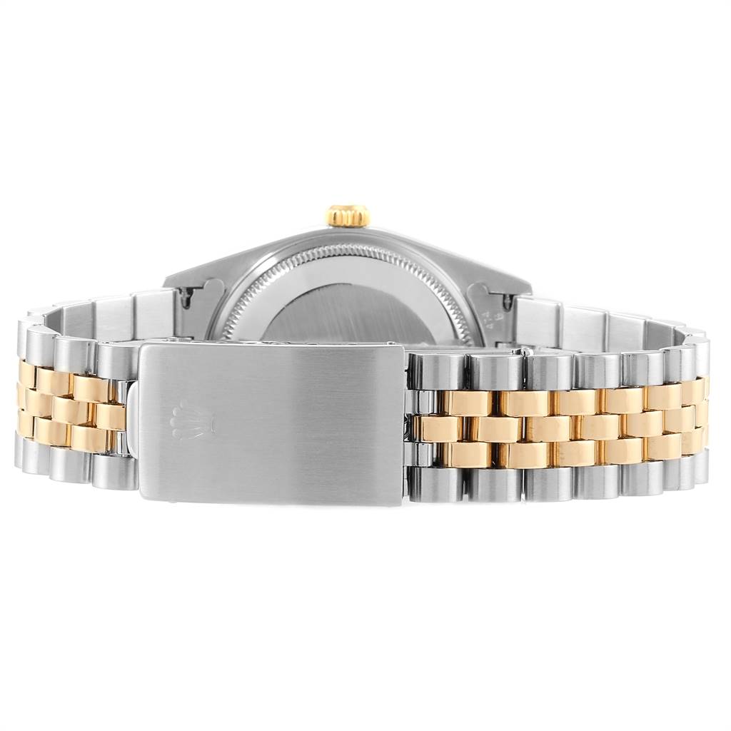 This image shows the back case and bracelet clasp of the Rolex Oyster Perpetual 14233 Men's Steel and Gold (two tone) Blue Dial 14233 Men's Steel and Gold (two tone) Blue Dial watch, featuring a two-tone design.