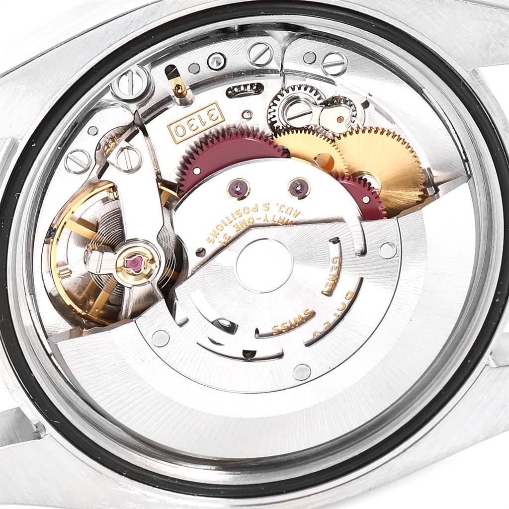 This image shows the internal mechanism of a Rolex Oyster Perpetual 116000 Men's Stainless Steel Blue Dial 116000 Men's Stainless Steel Blue Dial watch, viewed from the back case.