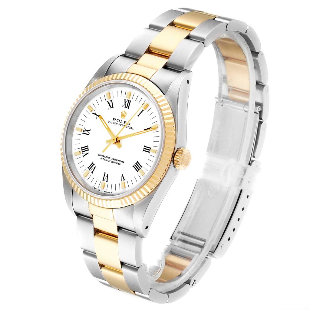 The Rolex Oyster Perpetual 14233 Men
s Steel and Gold (two tone) White Dial 14233 Men
s Steel and Gold (two tone) White Dial watch is shown at a three-quarter angle, displaying the dial, case, bezel, crown, and bracelet.