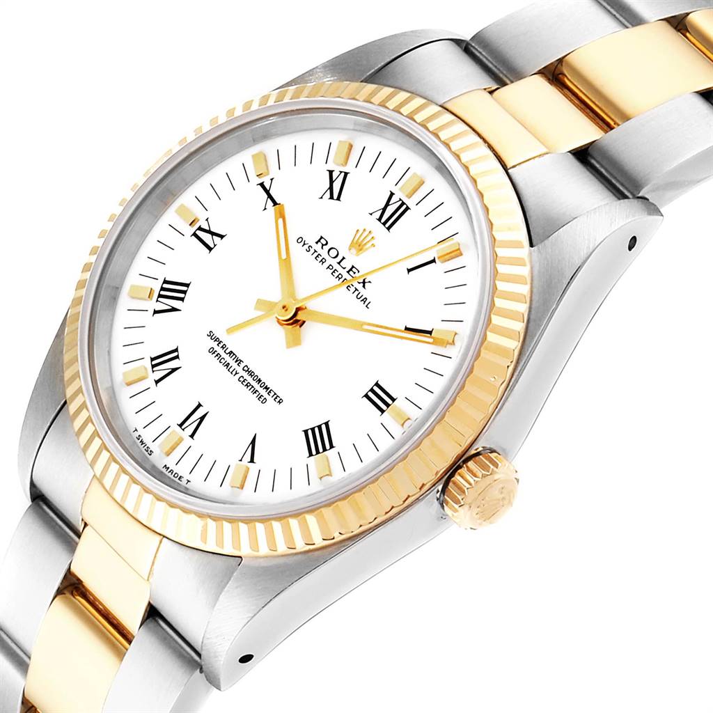The image shows a close-up, angled view of the Rolex Oyster Perpetual 14233 Men
s Steel and Gold (two tone) White Dial 14233 Men
s Steel and Gold (two tone) White Dial watch, highlighting the dial, bezel, and part of the bracelet.