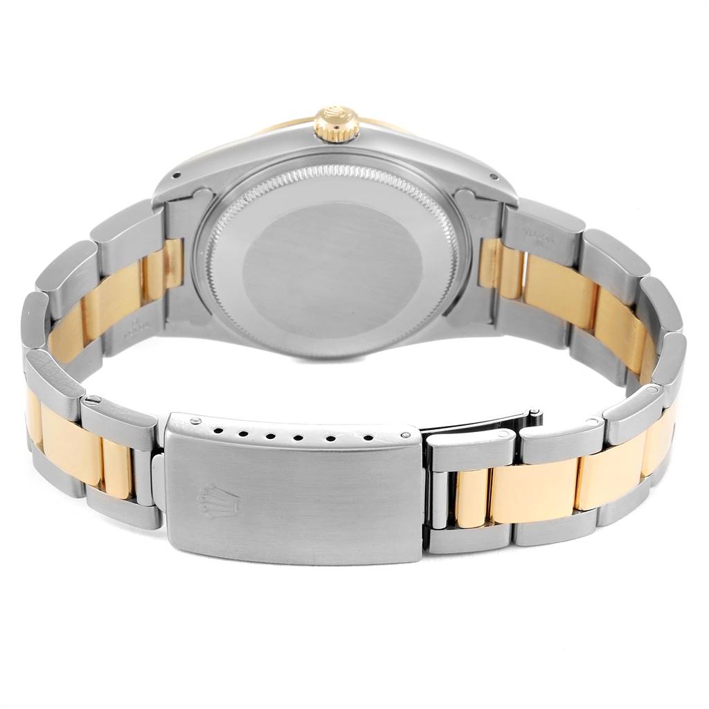 This image shows the back view of a Rolex Oyster Perpetual 14233 Men
s Steel and Gold (two tone) White Dial 14233 Men
s Steel and Gold (two tone) White Dial watch, featuring the bracelet and case back.