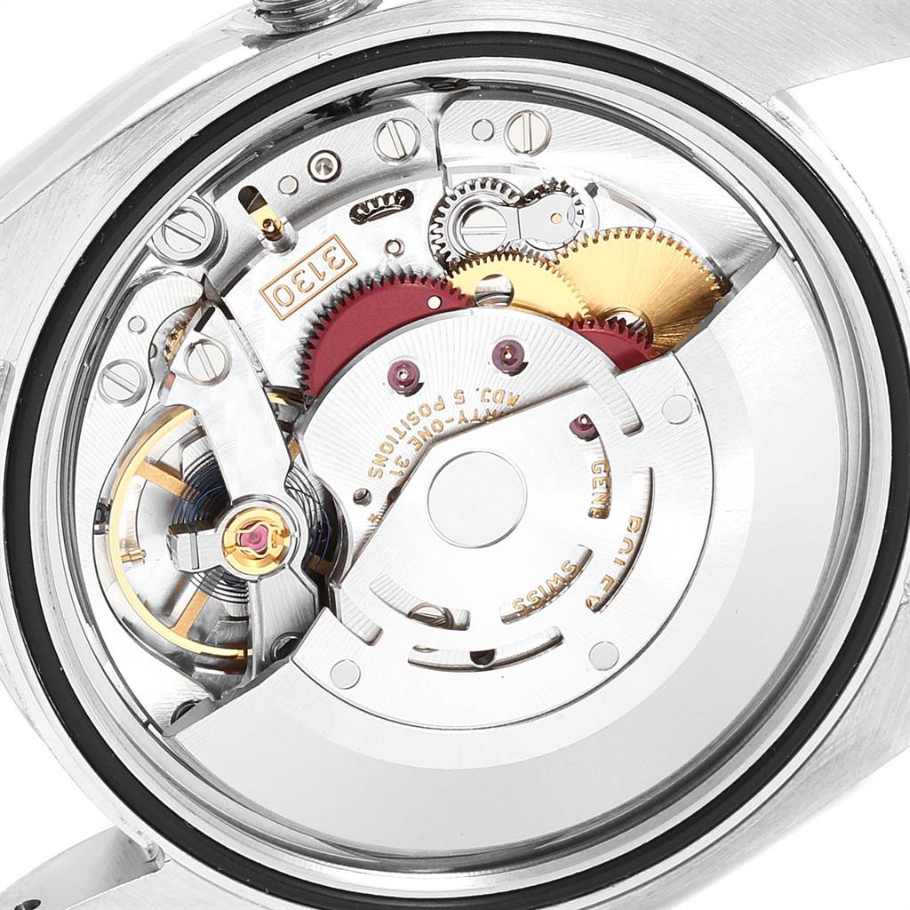 This image shows a close-up view of the movement mechanism of a Rolex Oyster Perpetual 116000 Men's Stainless Steel Grey Dial 116000 Men's Stainless Steel Grey Dial watch.