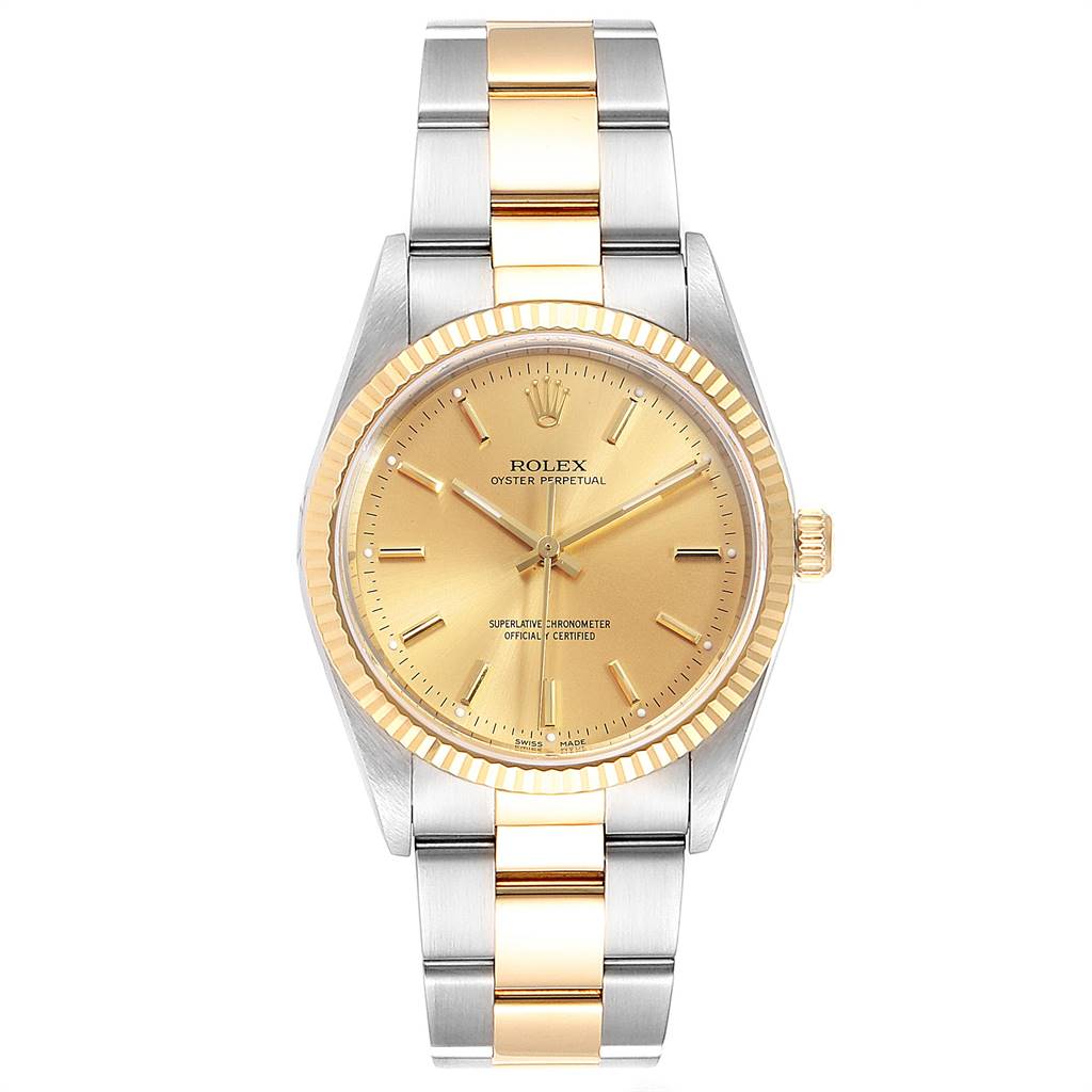 The image shows a frontal view of a Rolex Oyster Perpetual 14233 Men
s Steel and Gold (two tone) Champagne Dial 14233 Men
s Steel and Gold (two tone) Champagne Dial watch with a gold dial and a two-tone bracelet.