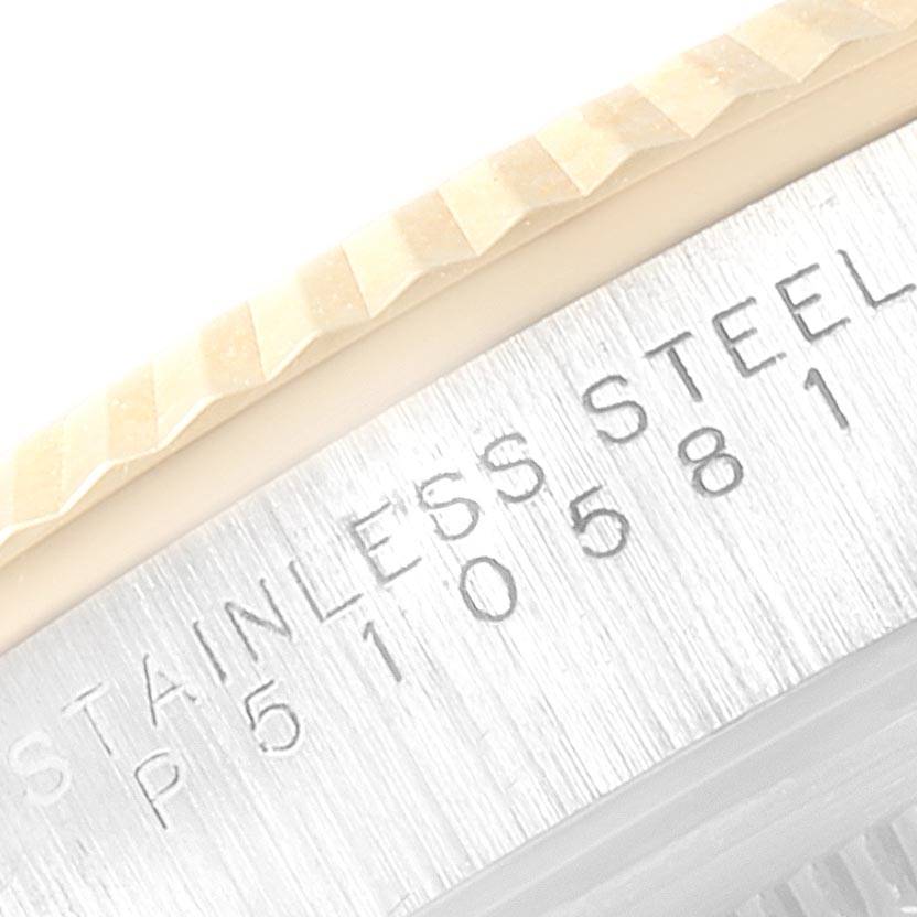 This image shows a close-up view of the bezel and the engraved serial number of a Rolex Oyster Perpetual 14233 Men
s Steel and Gold (two tone) Champagne Dial 14233 Men
s Steel and Gold (two tone) Champagne Dial watch.