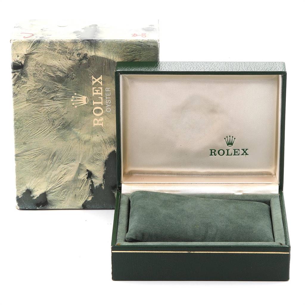 The image shows the open box and outer packaging for a Rolex Oyster Perpetual 14233 Men
s Steel and Gold (two tone) Champagne Dial 14233 Men
s Steel and Gold (two tone) Champagne Dial watch.