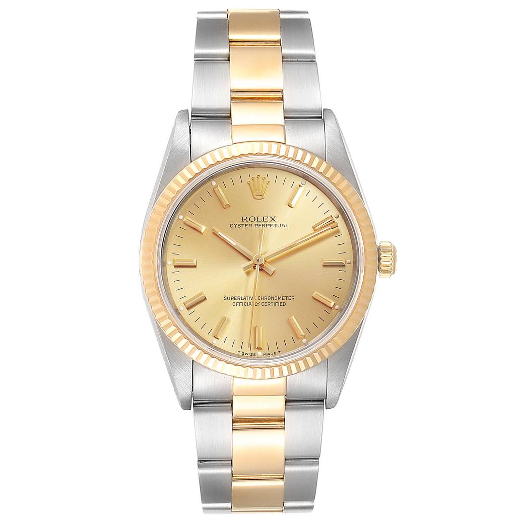 The Rolex Oyster Perpetual 14233 Men
s Steel and Gold (two tone) Champagne Dial 14233 Men
s Steel and Gold (two tone) Champagne Dial watch is shown from a top-down angle, displaying its gold-toned dial, bezel, and two-tone bracelet.