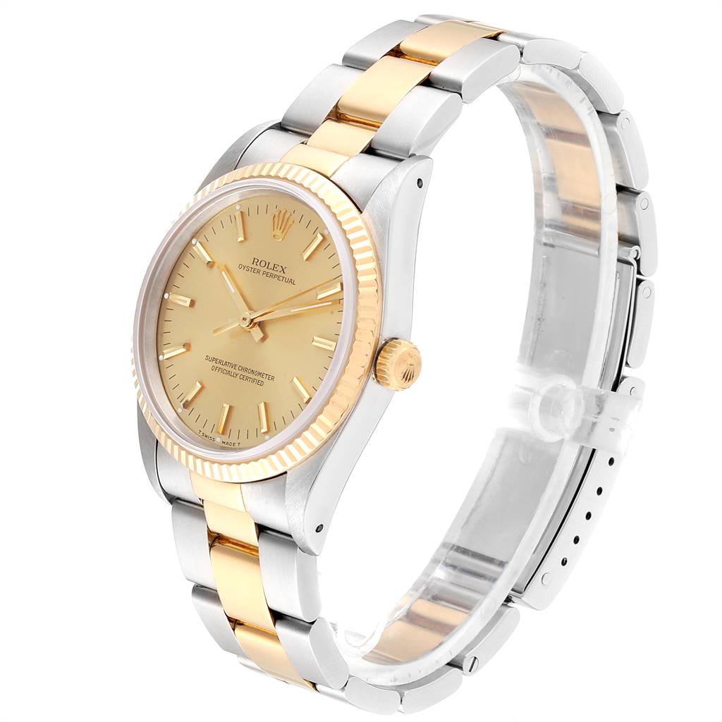 The image shows a side-angle view of the Rolex Oyster Perpetual 14233 Men
s Steel and Gold (two tone) Champagne Dial 14233 Men
s Steel and Gold (two tone) Champagne Dial watch, highlighting the dial, bezel, crown, and bracelet.