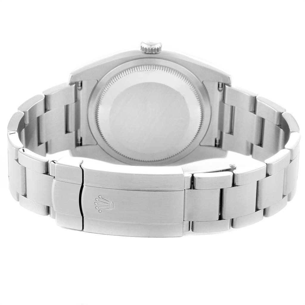 This image shows the back view of a Rolex Oyster Perpetual 116000 Men
s Stainless Steel Champagne Dial 116000 Men
s Stainless Steel Champagne Dial watch, highlighting the clasp and bracelet.