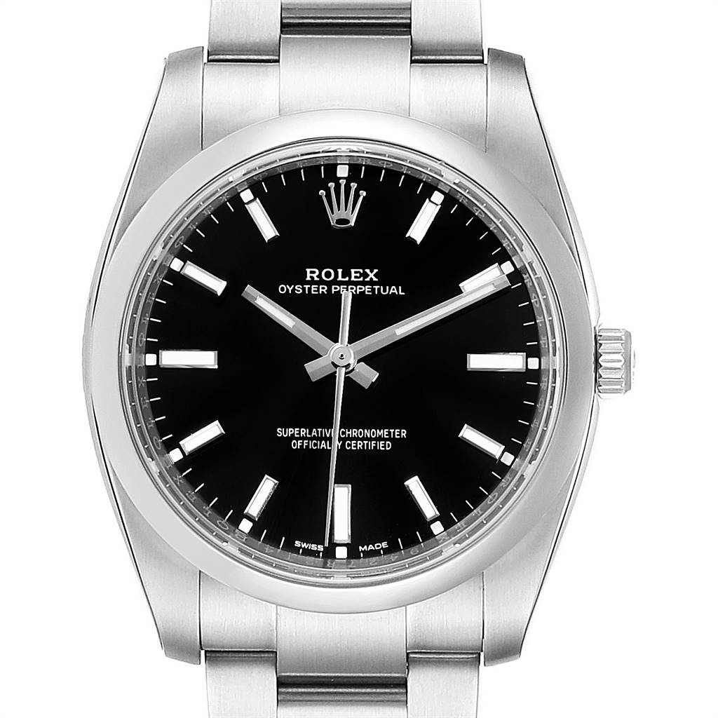This image shows the face and part of the strap of a Rolex Oyster Perpetual 114200 Men's Stainless Steel Black Dial 114200 Men's Stainless Steel Black Dial watch, viewed from the front.