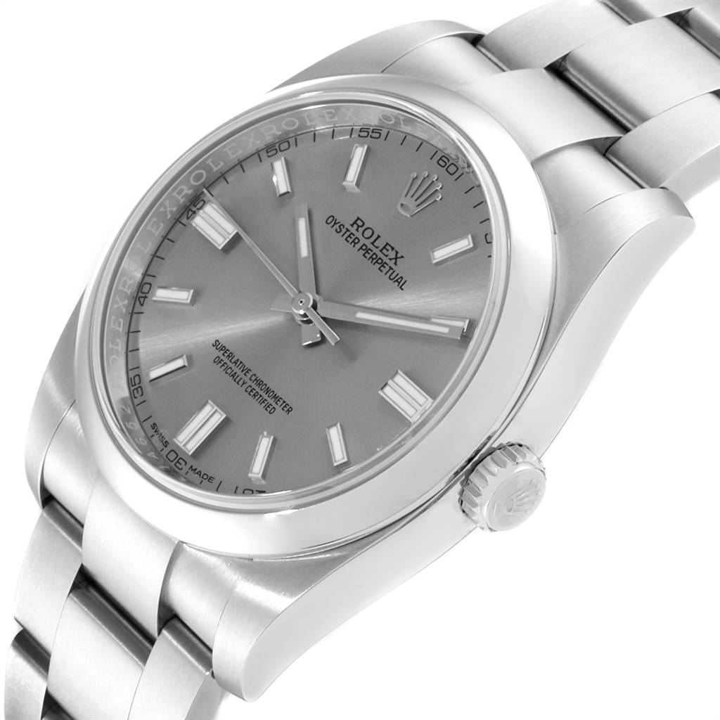 The Rolex Oyster Perpetual 116000 Men's Stainless Steel Grey Dial 116000 Men's Stainless Steel Grey Dial watch is shown from an angled view, highlighting its dial, case, crown, and bracelet.