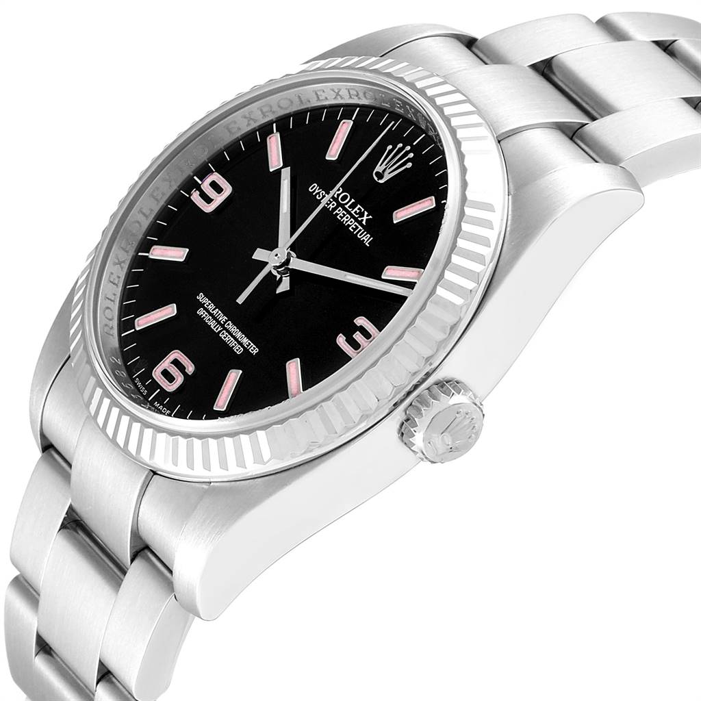 The image shows a side angle of a Rolex Oyster Perpetual 116034 Men's Stainless Steel Black Dial 116034 Men's Stainless Steel Black Dial watch, highlighting the bezel, crown, dial, and a part of the bracelet.