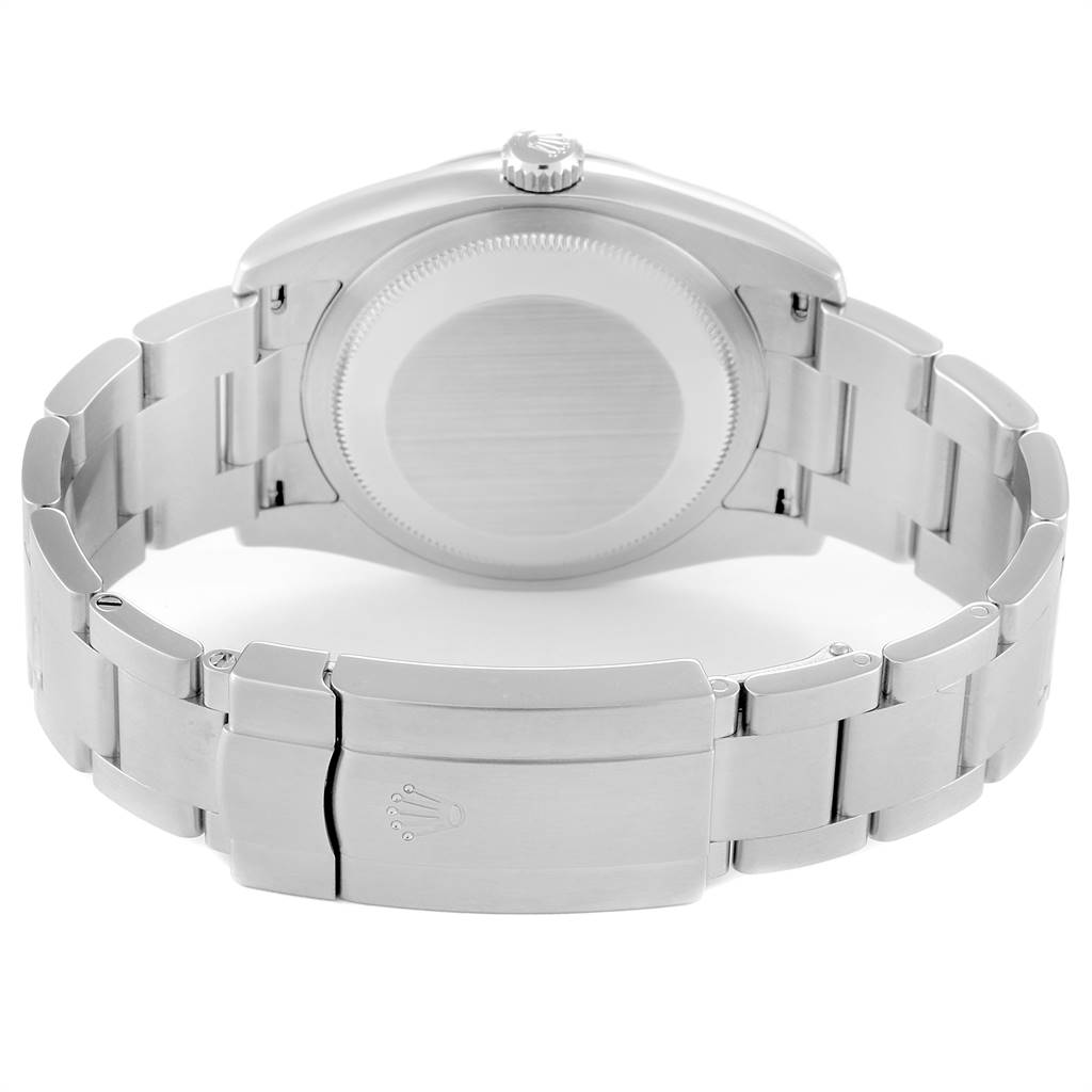 The image shows the back view of a Rolex Oyster Perpetual 116034 Men's Stainless Steel Black Dial 116034 Men's Stainless Steel Black Dial watch, highlighting its case back and bracelet clasp.