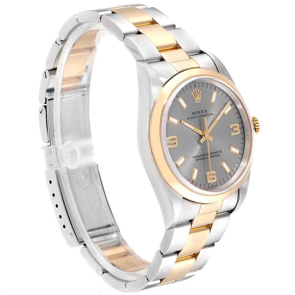 The Rolex Oyster Perpetual 14203 Men's Steel and Gold (two tone) Grey Dial 14203 Men's Steel and Gold (two tone) Grey Dial watch is shown at a three-quarter angle, highlighting its bracelet, case, dial, and crown.