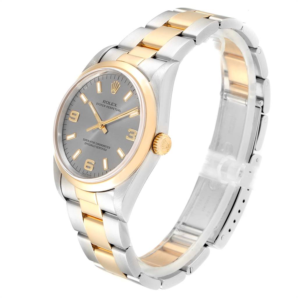 This image shows a Rolex Oyster Perpetual 14203 Men's Steel and Gold (two tone) Grey Dial 14203 Men's Steel and Gold (two tone) Grey Dial watch at a three-quarter angle, displaying its face, bracelet, and crown.
