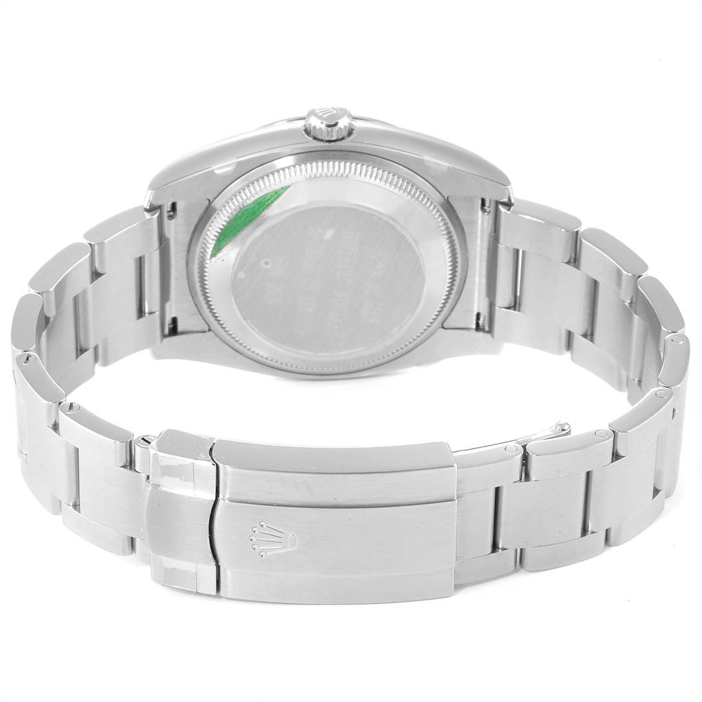 The image shows the back view of a Rolex Oyster Perpetual 114200 Men's Stainless Steel Blue Dial 114200 Men's Stainless Steel Blue Dial watch, highlighting the bracelet and clasp.