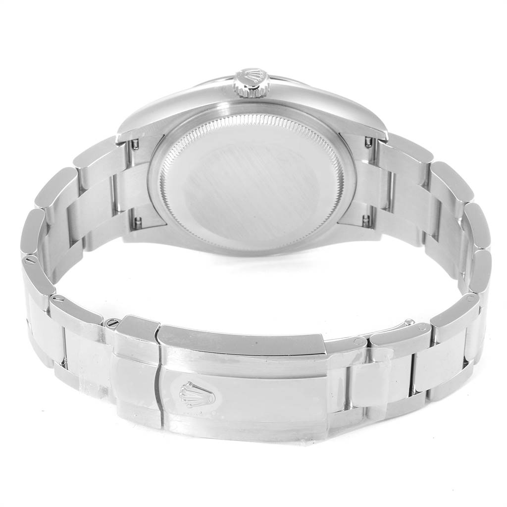 The image shows the back view of the Rolex Datejust 126200 Men's Stainless Steel Blue Dial 126200 Men's Stainless Steel Blue Dial watch, featuring the case back and stainless steel bracelet with clasp.