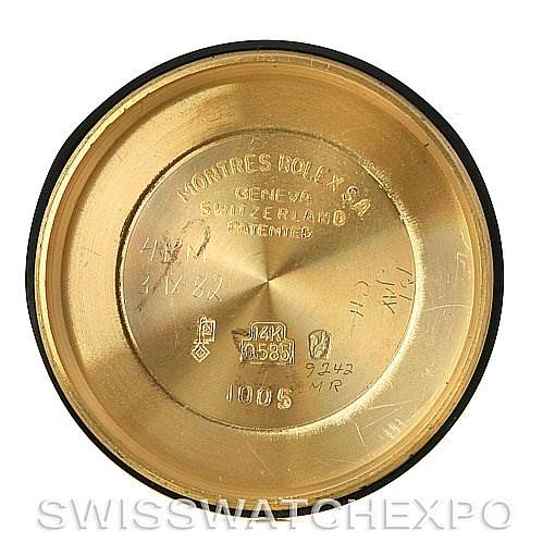This image shows the inside case back of a Rolex Oyster Perpetual Men
s Yellow Gold White Dial Men
s Yellow Gold White Dial watch, highlighting various inscriptions and markings.