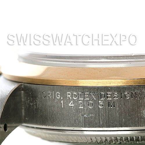 The image shows a close-up side view of the case and bezel of a Rolex Oyster Perpetual 14203 Men's Steel and Gold (two tone) Black Dial 14203 Men's Steel and Gold (two tone) Black Dial model with the engraved model number 14203M.