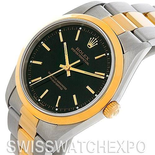 The image shows a Rolex Oyster Perpetual 14203 Men's Steel and Gold (two tone) Black Dial 14203 Men's Steel and Gold (two tone) Black Dial watch at a three-quarter view angle, highlighting its face, bezel, crown, and bracelet.