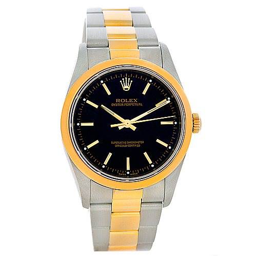This image shows a Rolex Oyster Perpetual 14203 Men's Steel and Gold (two tone) Black Dial 14203 Men's Steel and Gold (two tone) Black Dial watch from a front angle, displaying its dual-tone bracelet, black dial, and gold bezel.