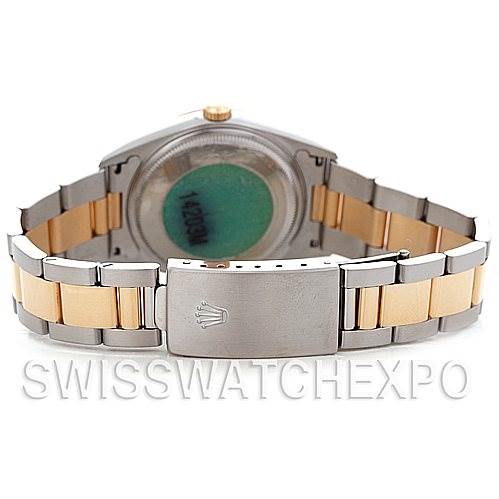 This image shows the back view and clasp of a Rolex Oyster Perpetual 14203 Men's Steel and Gold (two tone) Black Dial 14203 Men's Steel and Gold (two tone) Black Dial watch, highlighting its stainless steel and gold bracelet.