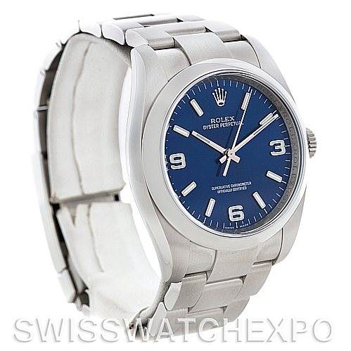 This image shows a side-angle view of a Rolex Oyster Perpetual 116000BLASO Men's Stainless Steel Blue Dial 116000BLASO Men's Stainless Steel Blue Dial watch featuring a blue dial and a stainless steel bracelet.