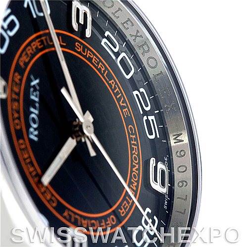The image shows a close-up of the dial and bezel of the Rolex Oyster Perpetual 116000 Men's Stainless Steel Black Dial 116000 Men's Stainless Steel Black Dial watch, highlighting the hour markers and branding.
