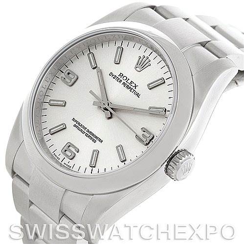 The image shows a Rolex Oyster Perpetual 116000 Men
s Stainless Steel Silver Dial 116000 Men
s Stainless Steel Silver Dial watch at an angled view with a focus on the face, bezel, and bracelet.