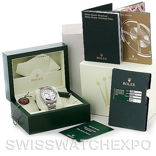 The image shows a Rolex Oyster Perpetual 116000 Men
s Stainless Steel Silver Dial 116000 Men
s Stainless Steel Silver Dial watch in its box, with accompanying manuals, warranty cards, and tags.