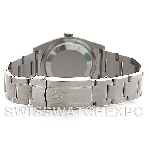 The image shows the back case and bracelet clasp of a Rolex Oyster Perpetual 116000 Men
s Stainless Steel Silver Dial 116000 Men
s Stainless Steel Silver Dial watch, viewed from the rear angle.