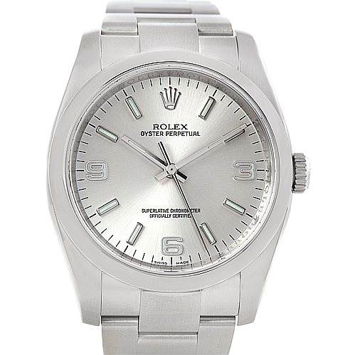 The image displays a front view of a Rolex Oyster Perpetual 116000 Men
s Stainless Steel Silver Dial 116000 Men
s Stainless Steel Silver Dial watch, showing the dial, hands, markers, crown, and part of the bracelet.
