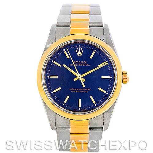 The image shows a front view of a Rolex Oyster Perpetual 14203 Men's Steel and Gold (two tone) Blue Dial 14203 Men's Steel and Gold (two tone) Blue Dial watch with a blue dial, gold and silver bezel, and matching bracelet.