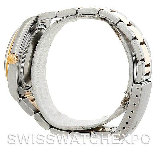 The image shows a side view of a Rolex Oyster Perpetual 14203 Men's Steel and Gold (two tone) Blue Dial 14203 Men's Steel and Gold (two tone) Blue Dial watch, focusing on the case, bracelet, and crown.