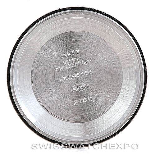 This image shows the inside case back of a Rolex Oyster Perpetual 14233 Men's Steel and Gold (two tone) Silver Dial 14233 Men's Steel and Gold (two tone) Silver Dial watch, with stamped branding and specifications.