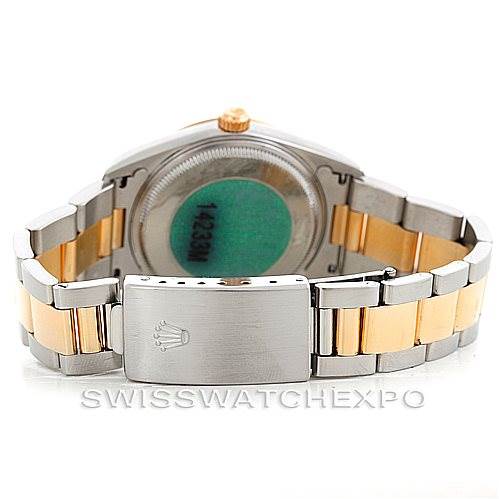 This image shows the back view of a Rolex Oyster Perpetual 14233 Men's Steel and Gold (two tone) Silver Dial 14233 Men's Steel and Gold (two tone) Silver Dial watch, focusing on its stainless steel and gold bracelet and clasp.