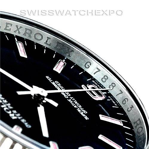 The image shows a close-up angle of the dial and bezel of a Rolex Oyster Perpetual 116034 Men's Stainless Steel Black Dial 116034 Men's Stainless Steel Black Dial watch, highlighting the hour markers and part of the "ROLEX" engraving.