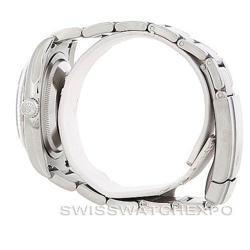 The image shows a side profile view of a Rolex Oyster Perpetual 116034 Men's Stainless Steel Black Dial 116034 Men's Stainless Steel Black Dial watch, focusing on its metal bracelet and crown.