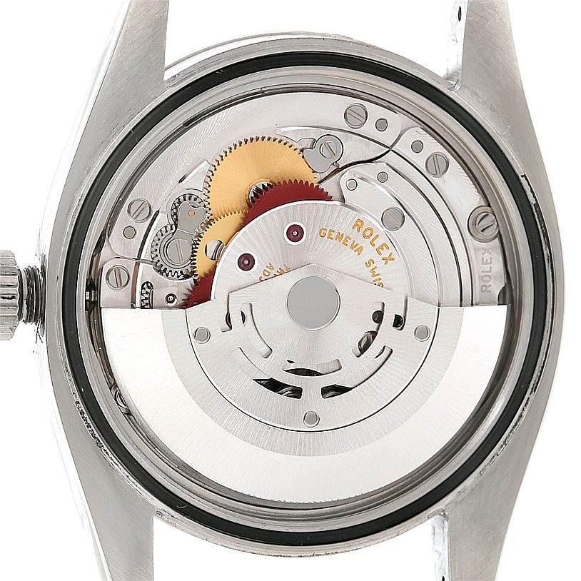 This image shows the internal mechanical movement of a Rolex Oyster Perpetual 116034 Men's Stainless Steel Blue Dial 116034 Men's Stainless Steel Blue Dial watch from the back view.