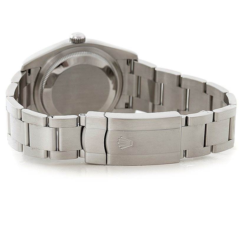 The image shows the back case and bracelet clasp of a Rolex Oyster Perpetual 116034 Men
s Stainless Steel Black Dial 116034 Men
s Stainless Steel Black Dial watch at a rear angle.