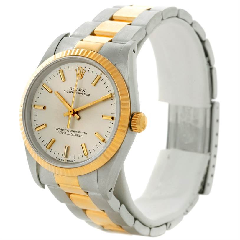 The image shows a Rolex Oyster Perpetual 14233 Men's Steel and Gold (two tone) Silver Dial 14233 Men's Steel and Gold (two tone) Silver Dial watch at an angled view, highlighting its dial, bezel, crown, and two-tone bracelet.