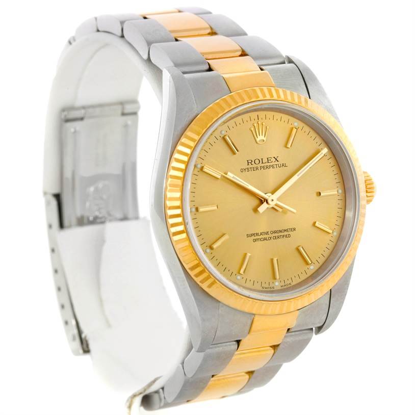 The image shows a Rolex Oyster Perpetual 14233 Men's Steel and Gold (two tone) Champagne Dial 14233 Men's Steel and Gold (two tone) Champagne Dial watch at an angle displaying the face, bezel, and bracelet.