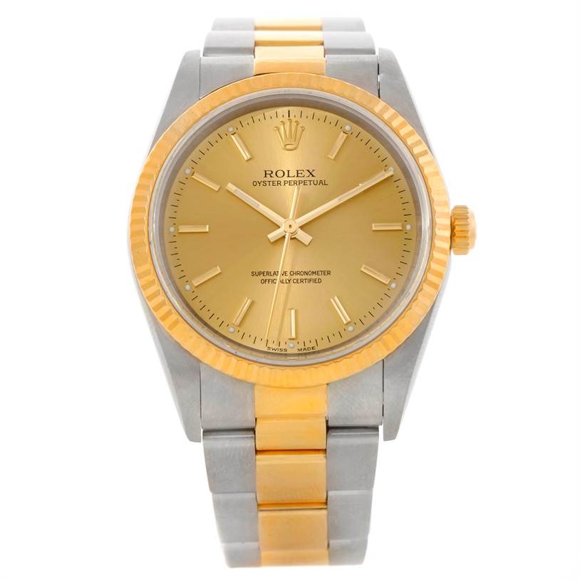The Rolex Oyster Perpetual 14233 Men's Steel and Gold (two tone) Champagne Dial 14233 Men's Steel and Gold (two tone) Champagne Dial watch in this image is shown from a top view, highlighting the dial, bezel, and bracelet.
