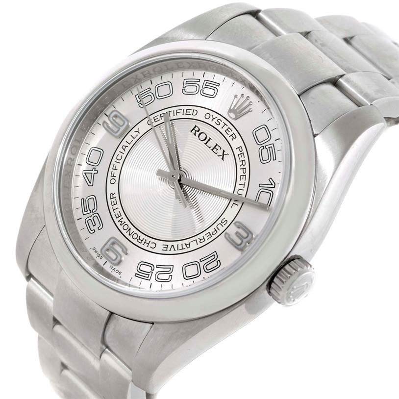 The image shows a close-up angle of a Rolex Oyster Perpetual 116000 Men's Stainless Steel Silver Dial 116000 Men's Stainless Steel Silver Dial watch, focusing on the dial, bezel, and part of the bracelet.