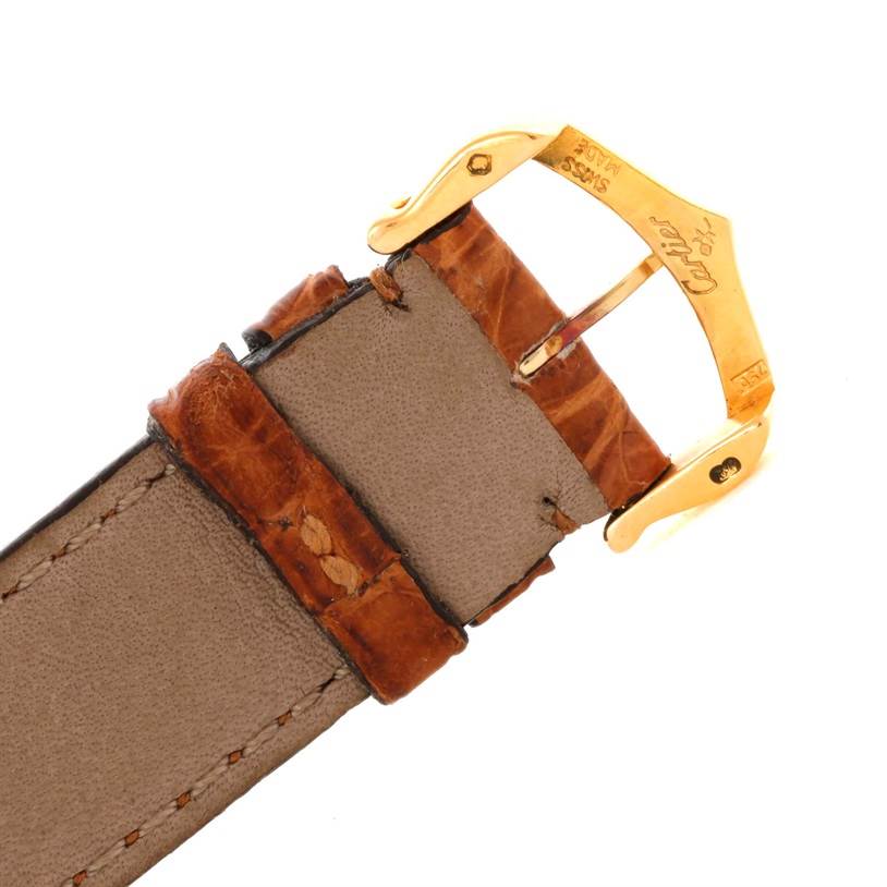 The image shows a close-up of the buckle and strap of a Cartier Tank Louis W1529856 Women's Yellow Gold Silver Dial W1529856 Women's Yellow Gold Silver Dial watch.