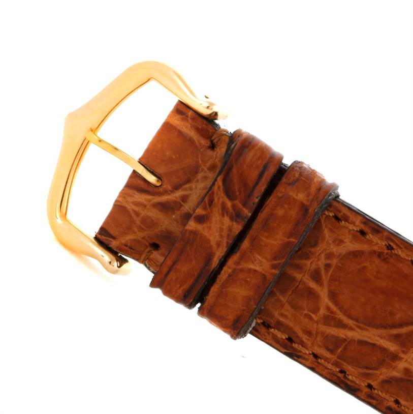 The image shows a close-up of the buckle and strap of a Cartier Tank Louis W1529856 Women's Yellow Gold Silver Dial W1529856 Women's Yellow Gold Silver Dial watch.