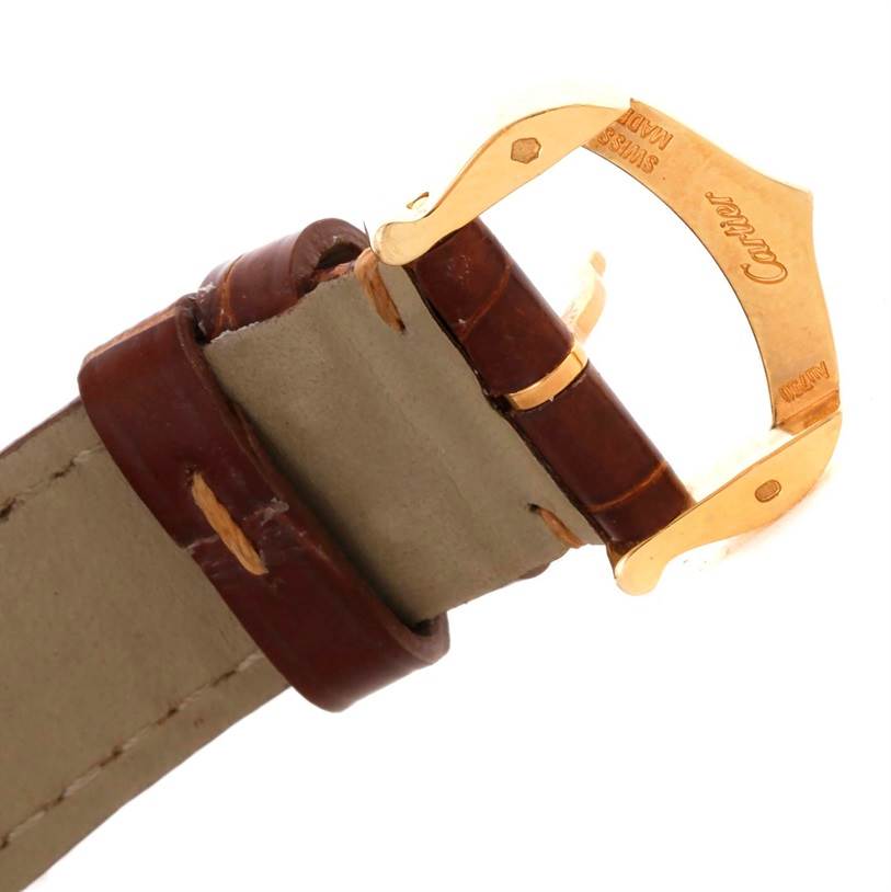 The image shows a side view of the strap and gold clasp buckle of a Cartier Tank Louis W1529856 Women's Yellow Gold Silver Dial W1529856 Women's Yellow Gold Silver Dial watch.