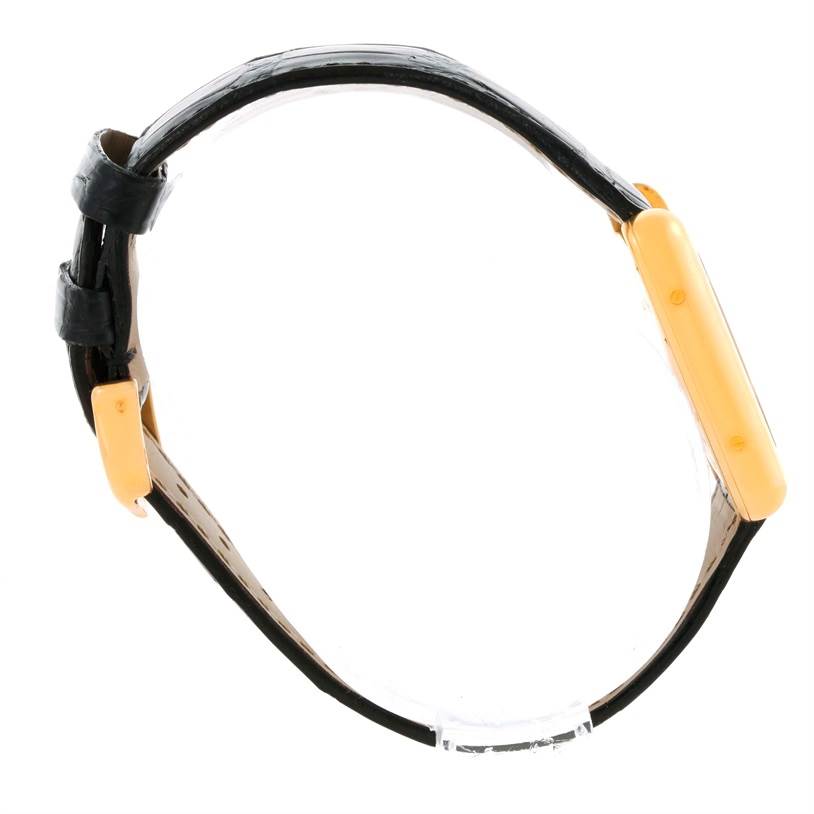 The image shows a Cartier Tank Louis W1529856 Women's Yellow Gold Silver Dial W1529856 Women's Yellow Gold Silver Dial watch from a side profile, highlighting its strap and case.